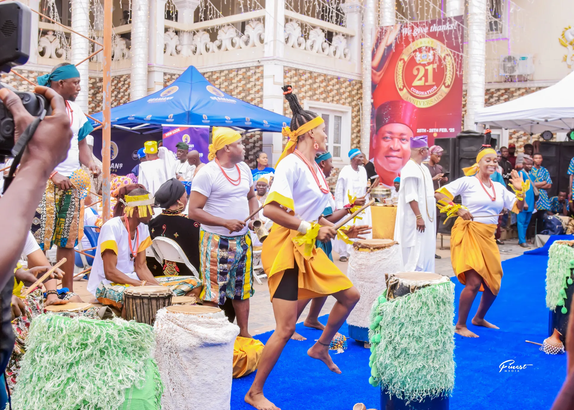 Traditional festival celebration with drums and dancers